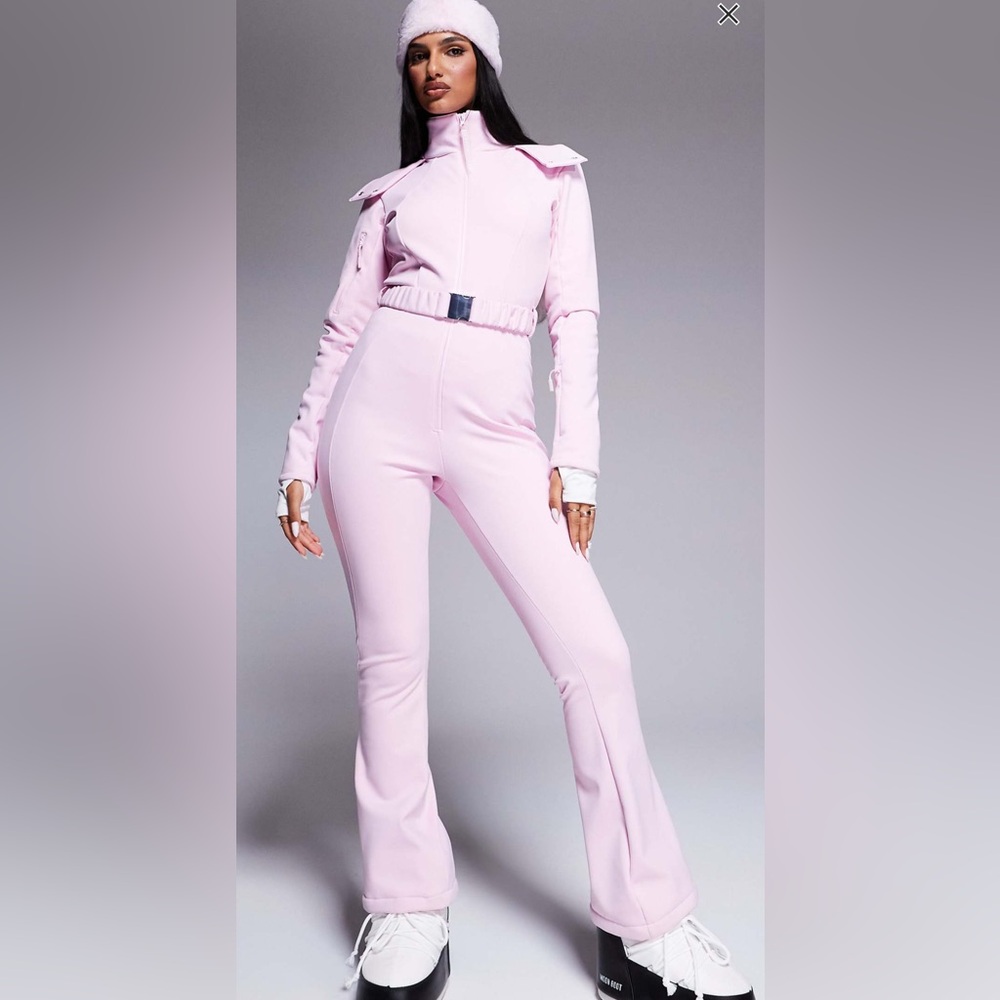 ASOS 4505 Ski belted ski suit with slim kick leg and faux fur hood in Pink